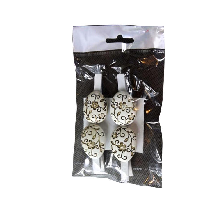 Białe i brązowe mini jajka dekoracyjne w kształcie klamerki