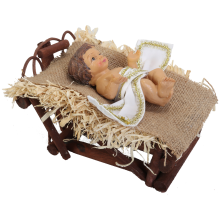 Figurka Jezuska leżącego w żłóbku na sianku